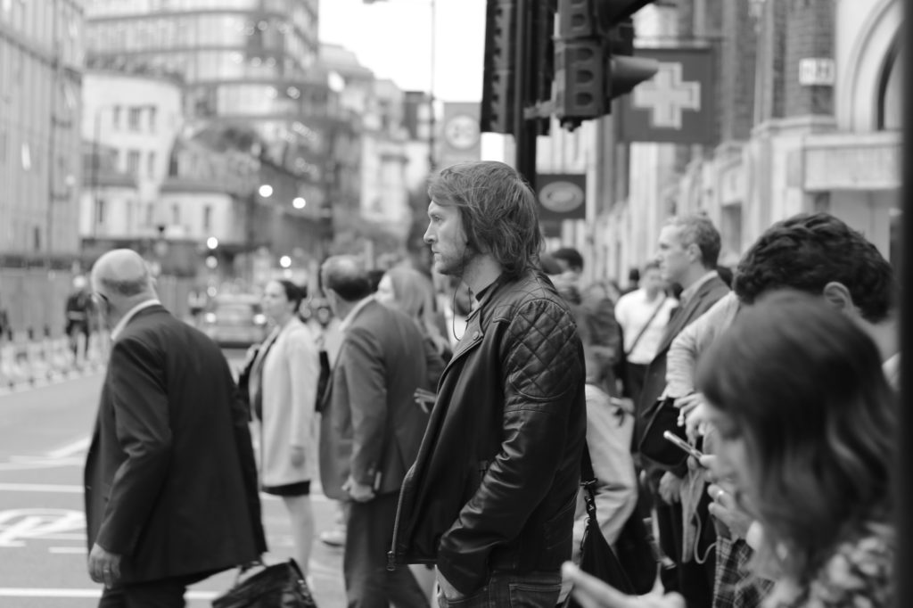 People waiting at traffic lights, London